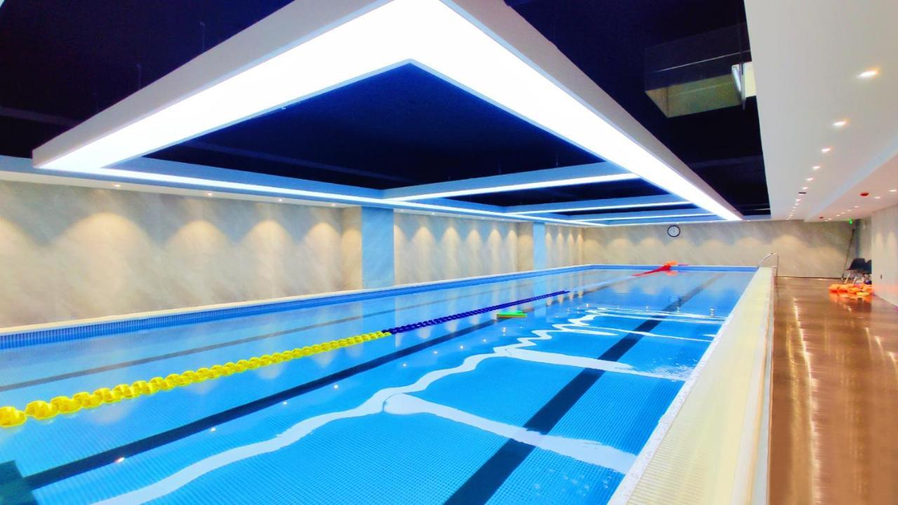 Yantai Meiya International Aparthotel Екстериор снимка