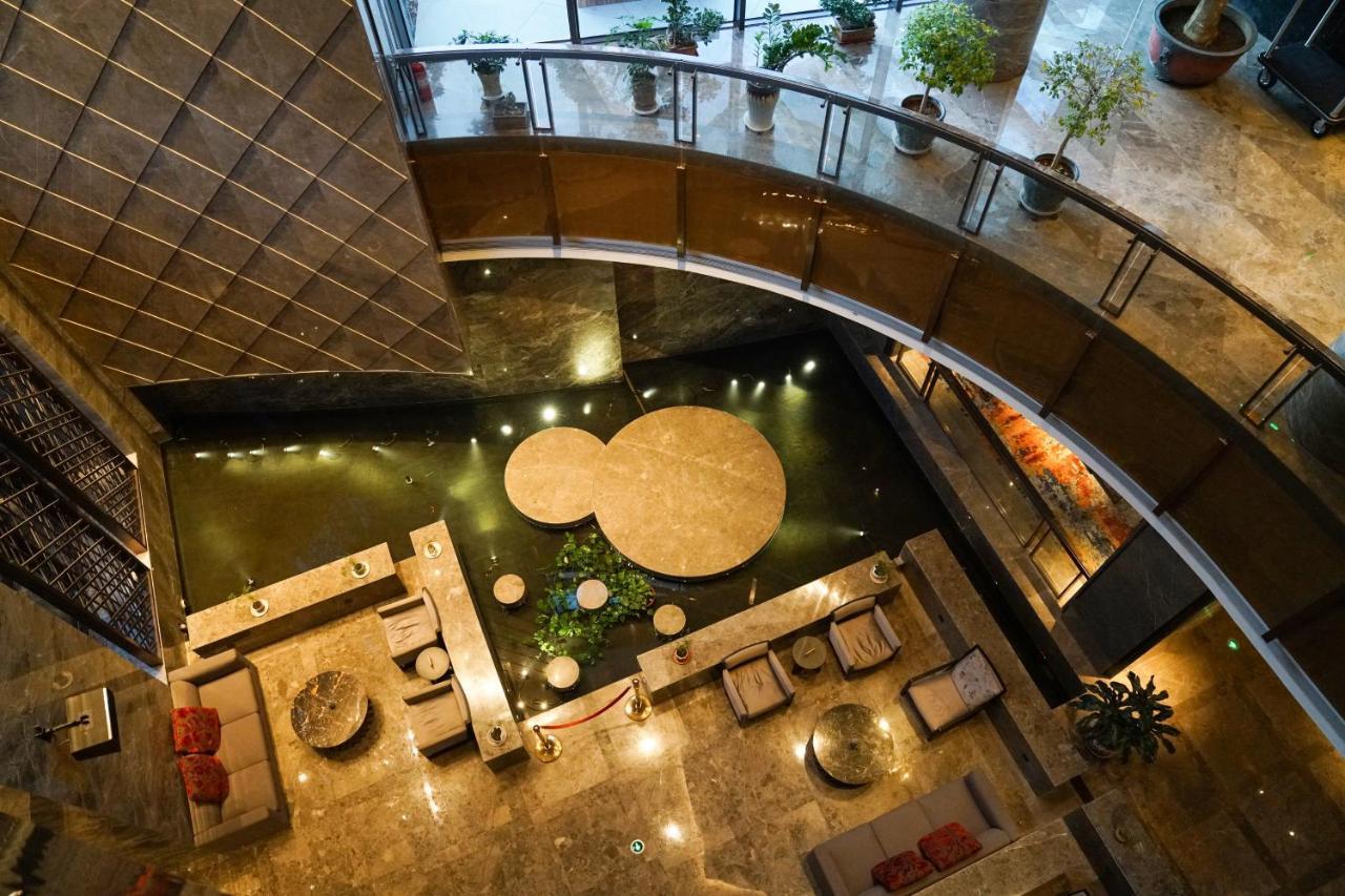 Yantai Meiya International Aparthotel Екстериор снимка