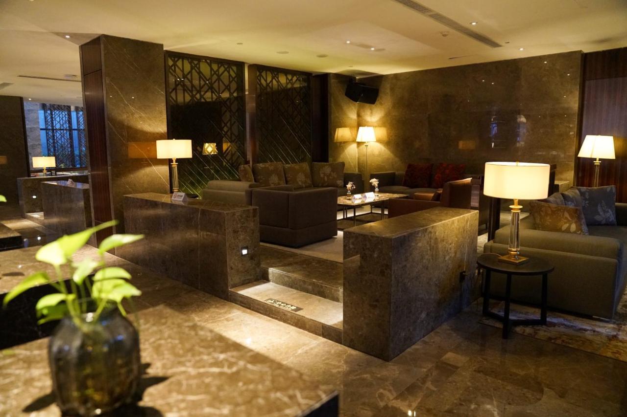 Yantai Meiya International Aparthotel Екстериор снимка